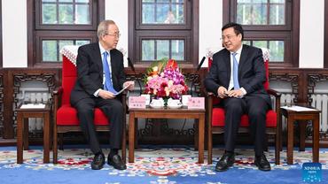 Xinhua president meets former UN secretary-general