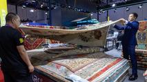 Feature: Afghan hand-woven carpets weave success in China's expanding market