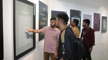 Bangladeshis enchanted by China's cultural treasures from Lingjiatan in photo exhibition