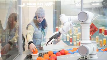 Chinese tech adds fresh twist to Olympic pin trading at Milan athlete village