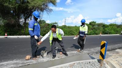 共话中国经济新机遇丨通讯：这条公路改变了当地人的生活——中企助力莫桑比克太特市铺就发展之路