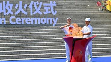 Flame return ceremony of torch relay for 6th Asian Beach Games held in Sanya