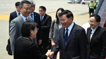 Lao top leader Thongloun arrives in China for state visit
