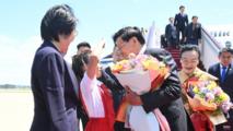 Lao president arrives in Beijing