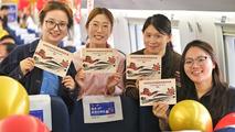 New high-speed rail lines carry holiday crowds, energize Chinese cities