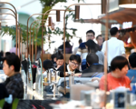 China's consumer services see robust recovery as holiday consumption soars