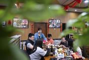China's services sector gains steam to cement economic recovery